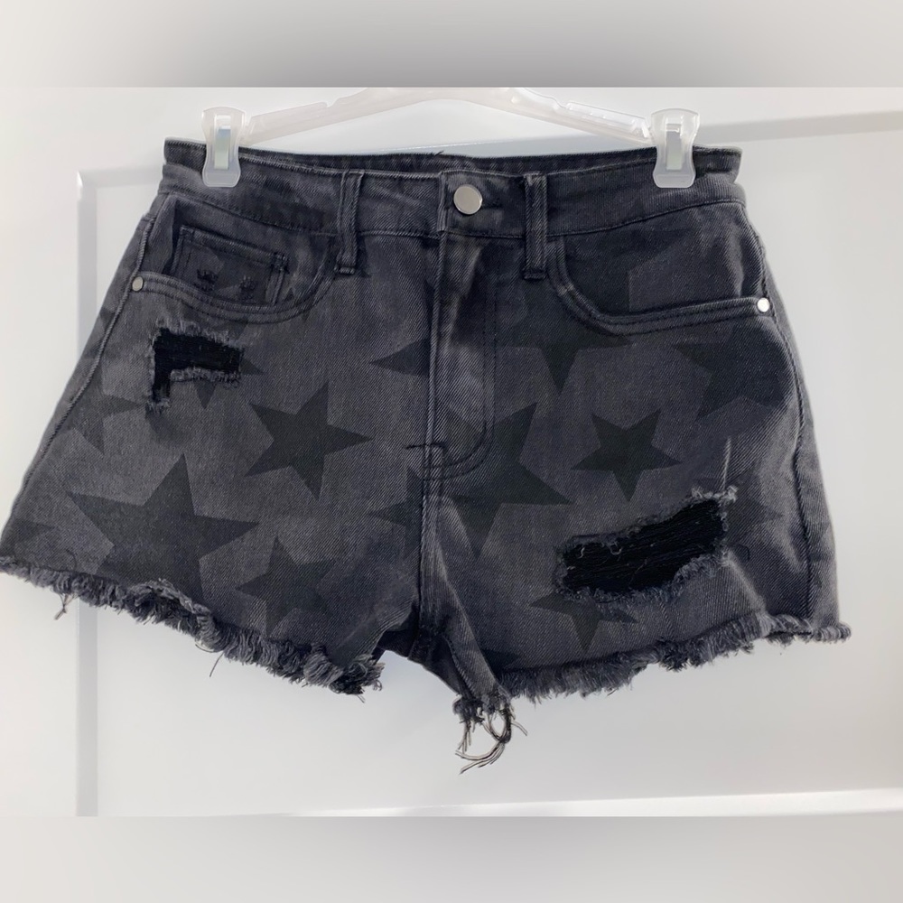 black jean shorts w star design